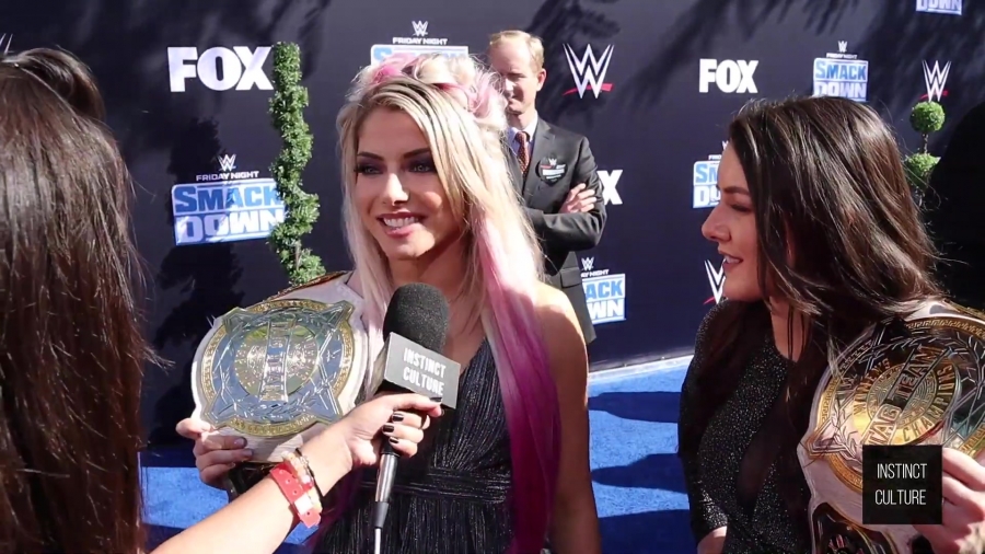 Alexa_Bliss_u0026_Nikki_Cross_Interview_-_WWE_Smackdown_20th_Anniversary_Blue_Carpet_062.jpg