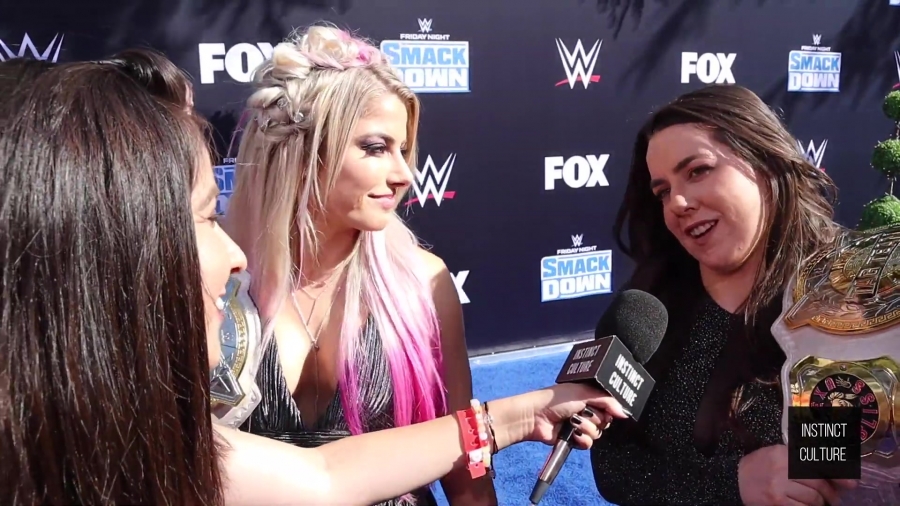 Alexa_Bliss_u0026_Nikki_Cross_Interview_-_WWE_Smackdown_20th_Anniversary_Blue_Carpet_187.jpg