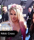 Alexa_Bliss_u0026_Nikki_Cross_Interview_-_WWE_Smackdown_20th_Anniversary_Blue_Carpet_038.jpg
