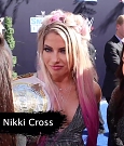 Alexa_Bliss_u0026_Nikki_Cross_Interview_-_WWE_Smackdown_20th_Anniversary_Blue_Carpet_040.jpg