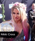 Alexa_Bliss_u0026_Nikki_Cross_Interview_-_WWE_Smackdown_20th_Anniversary_Blue_Carpet_042.jpg