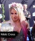 Alexa_Bliss_u0026_Nikki_Cross_Interview_-_WWE_Smackdown_20th_Anniversary_Blue_Carpet_046.jpg