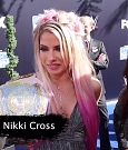 Alexa_Bliss_u0026_Nikki_Cross_Interview_-_WWE_Smackdown_20th_Anniversary_Blue_Carpet_047.jpg