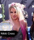 Alexa_Bliss_u0026_Nikki_Cross_Interview_-_WWE_Smackdown_20th_Anniversary_Blue_Carpet_048.jpg