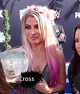 Alexa_Bliss_u0026_Nikki_Cross_Interview_-_WWE_Smackdown_20th_Anniversary_Blue_Carpet_049.jpg