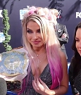 Alexa_Bliss_u0026_Nikki_Cross_Interview_-_WWE_Smackdown_20th_Anniversary_Blue_Carpet_050.jpg