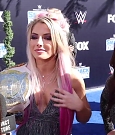 Alexa_Bliss_u0026_Nikki_Cross_Interview_-_WWE_Smackdown_20th_Anniversary_Blue_Carpet_058.jpg