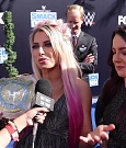 Alexa_Bliss_u0026_Nikki_Cross_Interview_-_WWE_Smackdown_20th_Anniversary_Blue_Carpet_074.jpg