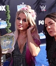 Alexa_Bliss_u0026_Nikki_Cross_Interview_-_WWE_Smackdown_20th_Anniversary_Blue_Carpet_113.jpg