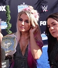 Alexa_Bliss_u0026_Nikki_Cross_Interview_-_WWE_Smackdown_20th_Anniversary_Blue_Carpet_115.jpg