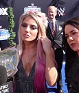 Alexa_Bliss_u0026_Nikki_Cross_Interview_-_WWE_Smackdown_20th_Anniversary_Blue_Carpet_120.jpg