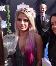 Alexa_Bliss_u0026_Nikki_Cross_Interview_-_WWE_Smackdown_20th_Anniversary_Blue_Carpet_124.jpg