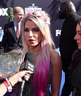 Alexa_Bliss_u0026_Nikki_Cross_Interview_-_WWE_Smackdown_20th_Anniversary_Blue_Carpet_139.jpg