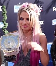 Alexa_Bliss_u0026_Nikki_Cross_Interview_-_WWE_Smackdown_20th_Anniversary_Blue_Carpet_055.jpg