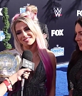 Alexa_Bliss_u0026_Nikki_Cross_Interview_-_WWE_Smackdown_20th_Anniversary_Blue_Carpet_078.jpg