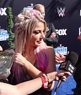 Alexa_Bliss_u0026_Nikki_Cross_Interview_-_WWE_Smackdown_20th_Anniversary_Blue_Carpet_085.jpg