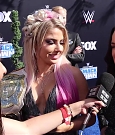 Alexa_Bliss_u0026_Nikki_Cross_Interview_-_WWE_Smackdown_20th_Anniversary_Blue_Carpet_099.jpg