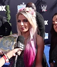 Alexa_Bliss_u0026_Nikki_Cross_Interview_-_WWE_Smackdown_20th_Anniversary_Blue_Carpet_142.jpg