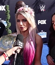 Alexa_Bliss_u0026_Nikki_Cross_Interview_-_WWE_Smackdown_20th_Anniversary_Blue_Carpet_143.jpg