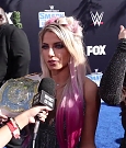 Alexa_Bliss_u0026_Nikki_Cross_Interview_-_WWE_Smackdown_20th_Anniversary_Blue_Carpet_146.jpg
