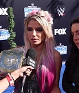 Alexa_Bliss_u0026_Nikki_Cross_Interview_-_WWE_Smackdown_20th_Anniversary_Blue_Carpet_157.jpg