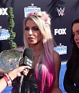 Alexa_Bliss_u0026_Nikki_Cross_Interview_-_WWE_Smackdown_20th_Anniversary_Blue_Carpet_161.jpg