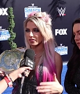 Alexa_Bliss_u0026_Nikki_Cross_Interview_-_WWE_Smackdown_20th_Anniversary_Blue_Carpet_162.jpg