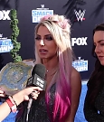 Alexa_Bliss_u0026_Nikki_Cross_Interview_-_WWE_Smackdown_20th_Anniversary_Blue_Carpet_164.jpg
