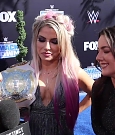 Alexa_Bliss_u0026_Nikki_Cross_Interview_-_WWE_Smackdown_20th_Anniversary_Blue_Carpet_204.jpg