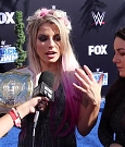 Alexa_Bliss_u0026_Nikki_Cross_Interview_-_WWE_Smackdown_20th_Anniversary_Blue_Carpet_234.jpg