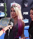Alexa_Bliss_u0026_Nikki_Cross_Interview_-_WWE_Smackdown_20th_Anniversary_Blue_Carpet_242.jpg