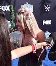 Alexa_Bliss_u0026_Nikki_Cross_Interview_-_WWE_Smackdown_20th_Anniversary_Blue_Carpet_283.jpg